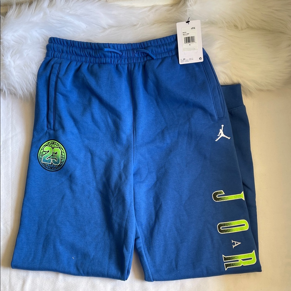 Jordan Boys Blue  Sweatpants with Neon Green 23 & JORDAN Lettering  Size XL.